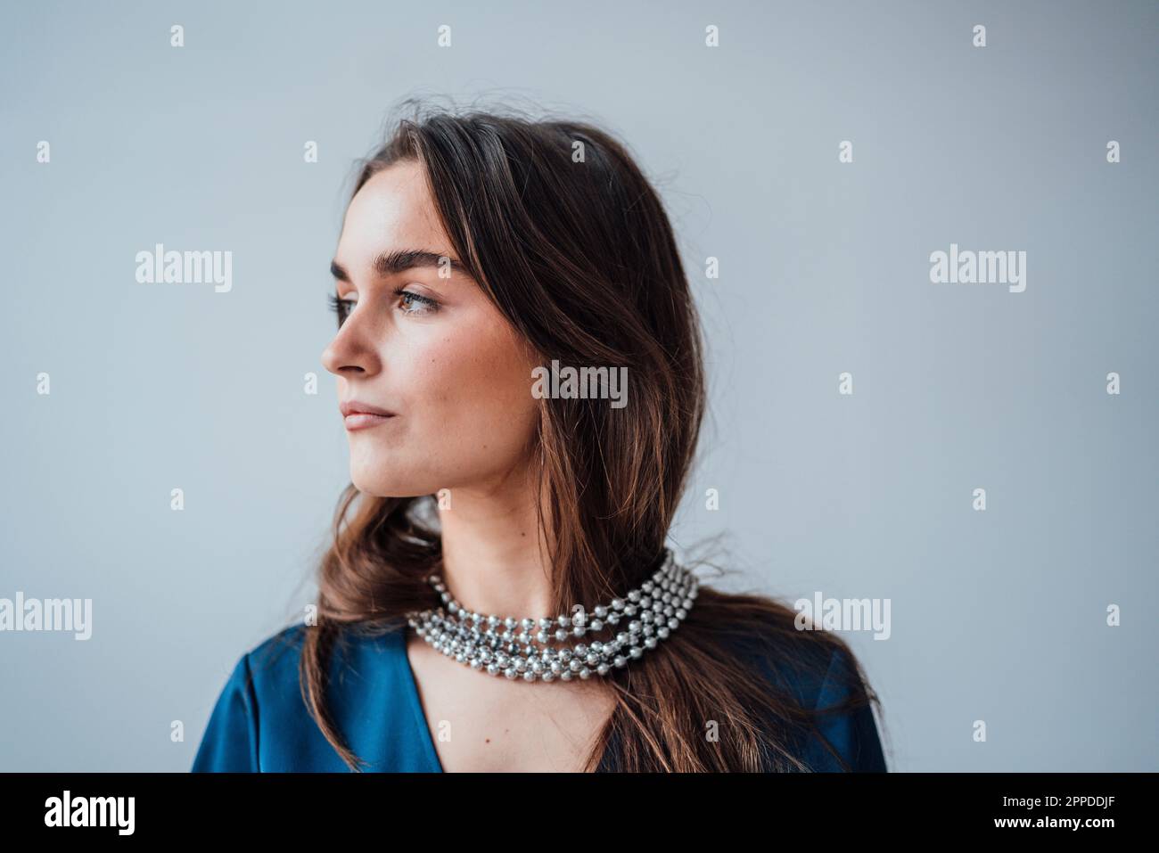 Wearing jewelry hi-res stock photography and images - Alamy