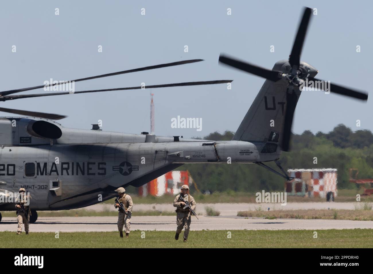 The Marine Air-Ground Task Force Demonstration Team displays the coordinated use of close-air support and infantry forces during the 2023 MCAS Beaufort Airshow at Marine Corps Air Station Beaufort, South Carolina, April 23, 2023. The MAGTF is combined of four elements: Command Element, Ground Combat Element, Aviation Combat Element and Logistics Combat Element that work seamlessly together. Within days, a MAGTF can be anywhere in the world and arrive ready to accomplish its mission. The MAGTF is the ideal rapid response team, able to quickly answer the call of duty, whatever it may be, whereve Stock Photo