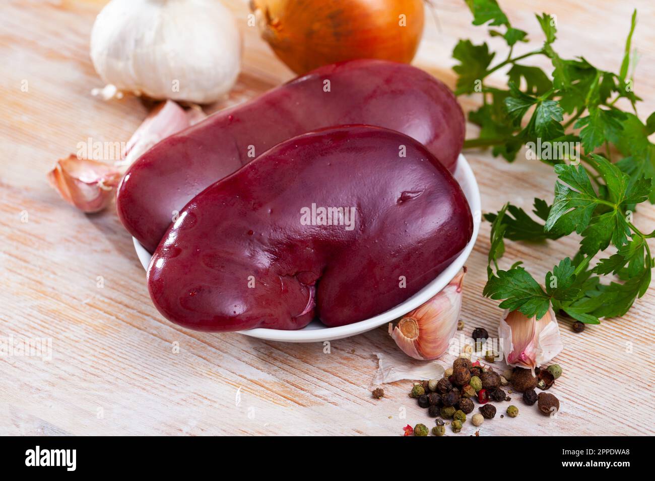 Raw pork kidneys Stock Photo Alamy