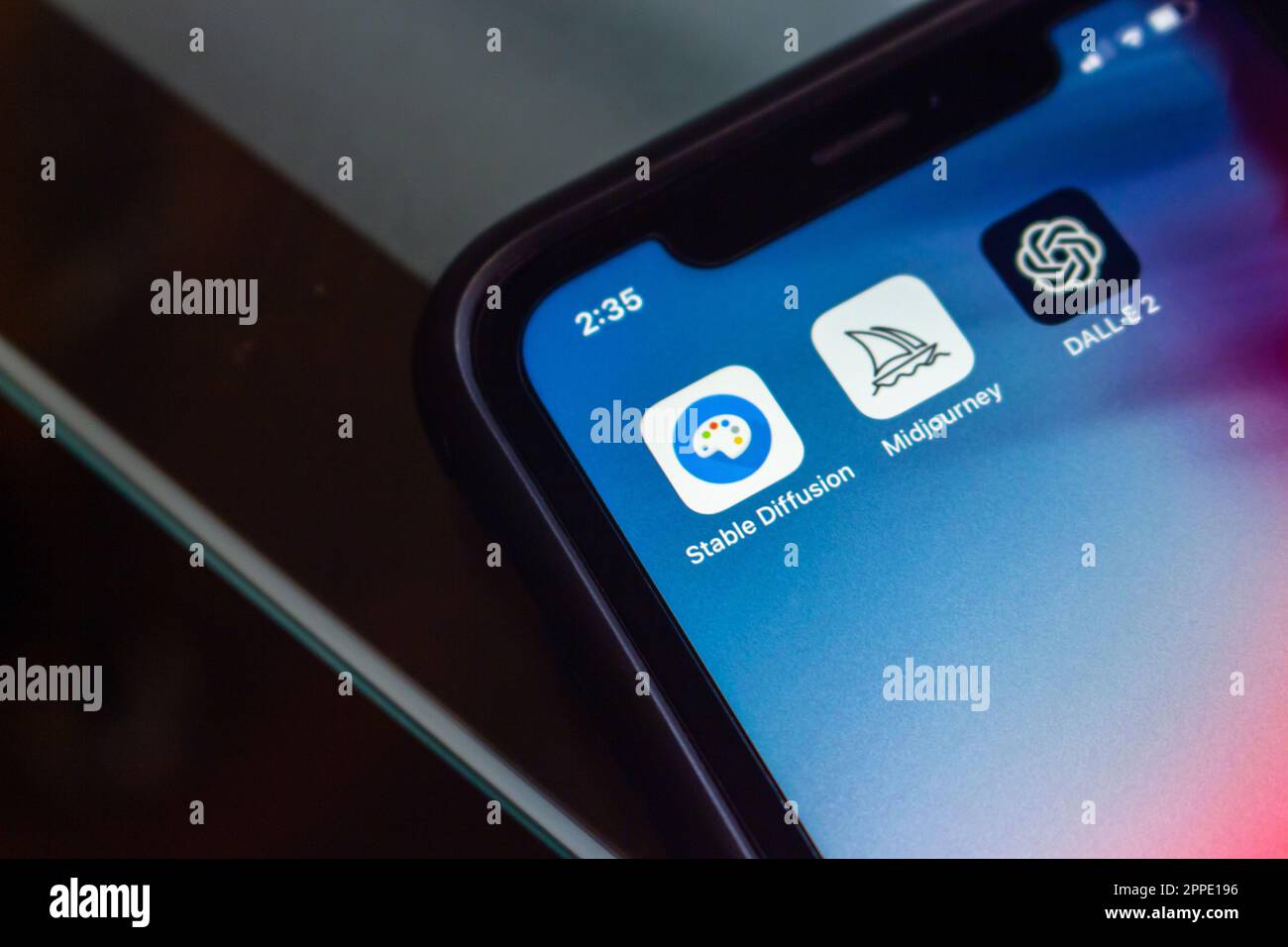 Vancouver, CANADA - Apr 19 2023: Stable Diffusion, Midjourney and DALL-E 2 icons seen in an iPhone screen. Text-to-image Generative Art and AI concept Stock Photo