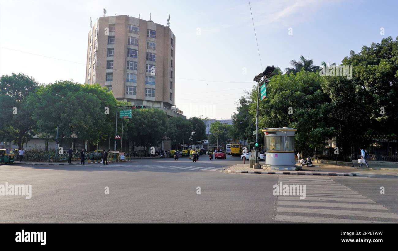 Bangalore,Karnataka,India-April 18 2023: Corporation circle of Bangalore during sunrise with limited vehicle movement or traffic. One of the busiest j Stock Photo