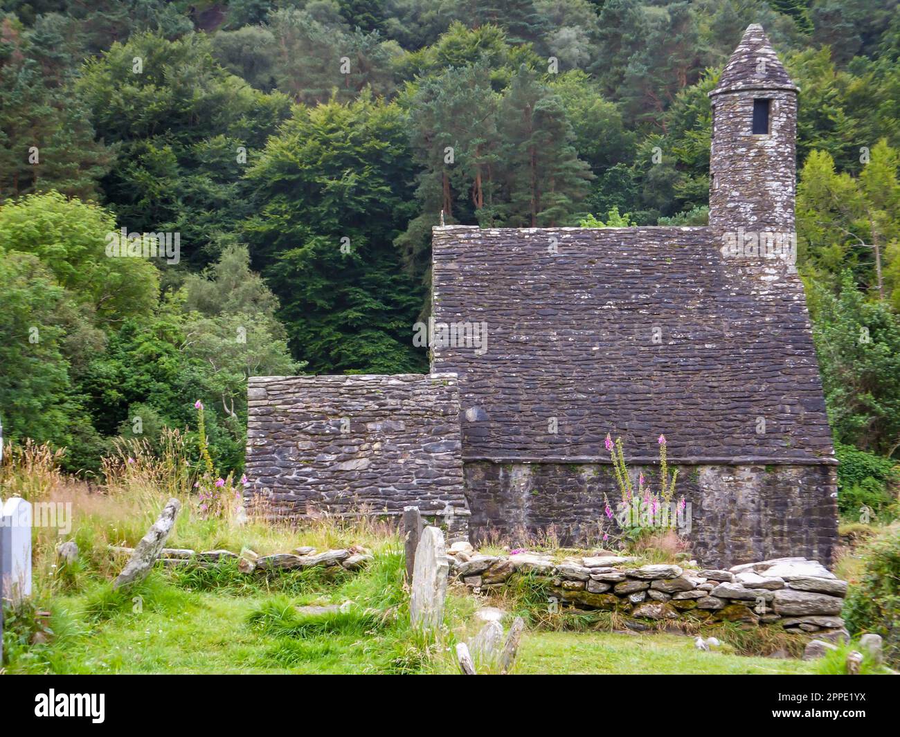 The ancient Saint Kevin's Kitchen at the Glendalough Monastic City in Wicklow Mountains National Park, Ireland. Stock Photo