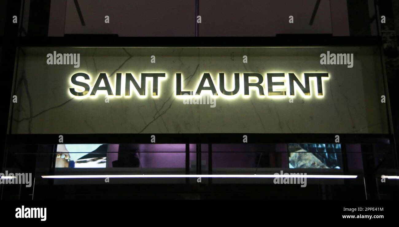 French luxury fashion house Yves Saint Laurent logo seen in