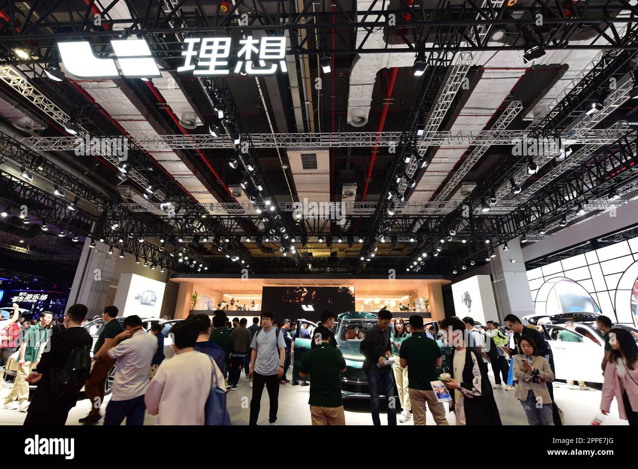 Visitors visit the booth of LI AUTO at the 2023 Shanghai Auto Show in ...
