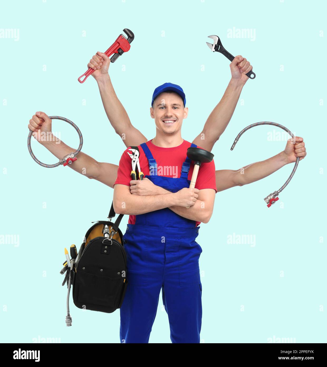 Plumber with different tools on light blue background. Multitasking handyman Stock Photo