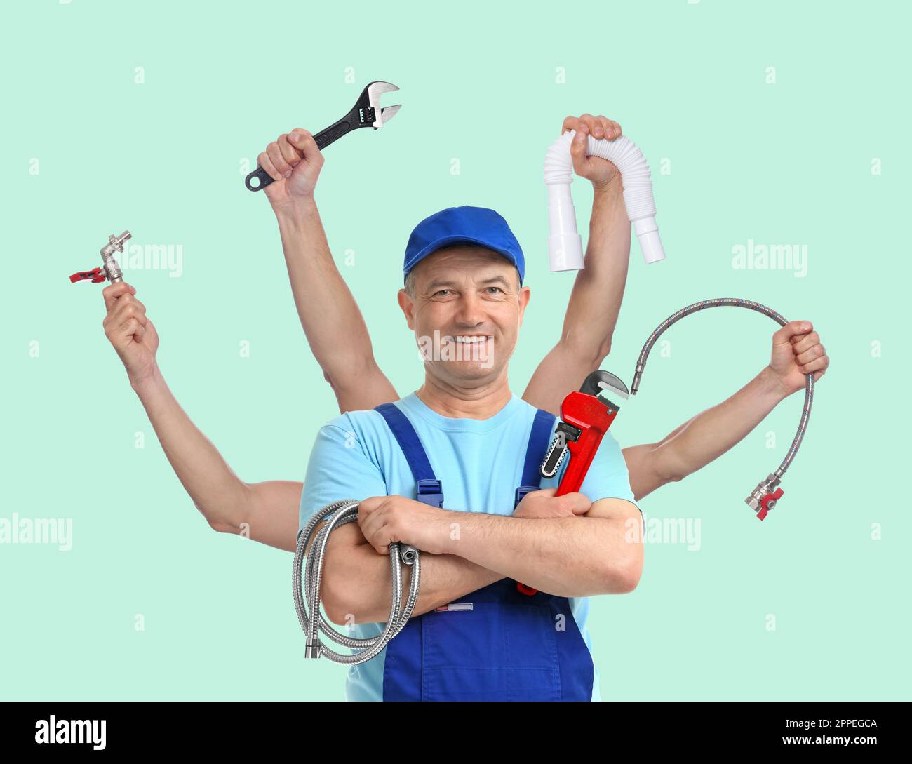 Plumber with different tools on light blue background. Multitasking handyman Stock Photo