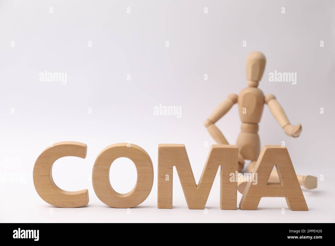 Word coma made wooden hi-res stock photography and images - Alamy