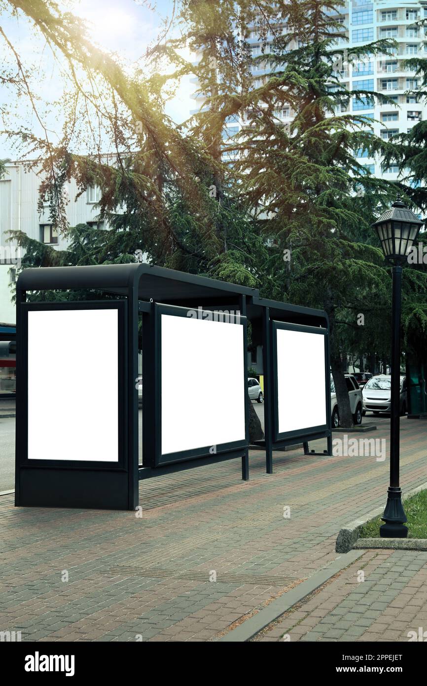 Blank advertising boards on transport stop. Space for design Stock ...