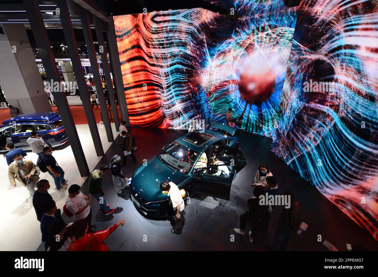 SHANGHAI, CHINA - APRIL 21, 2023 - A crowd gathers at the stand of ...