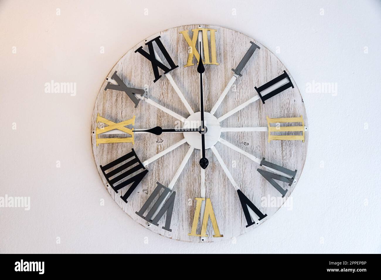 Wall clock isolated on white background. Wall clock on white wall