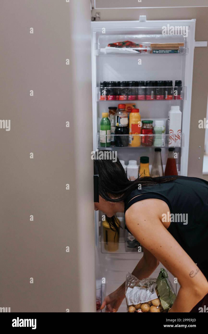 Women fridge hires stock photography and images Alamy