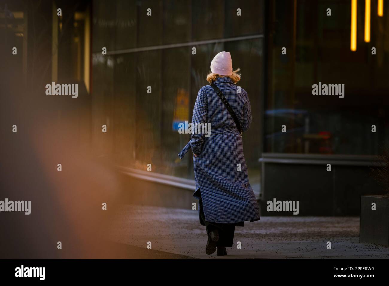 Woman walking city rear view hi-res stock photography and images - Alamy