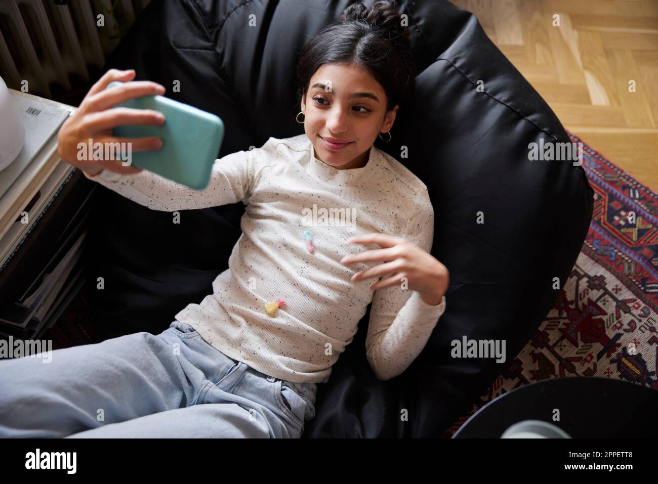 Girl bean bag hi-res stock photography and images - Alamy