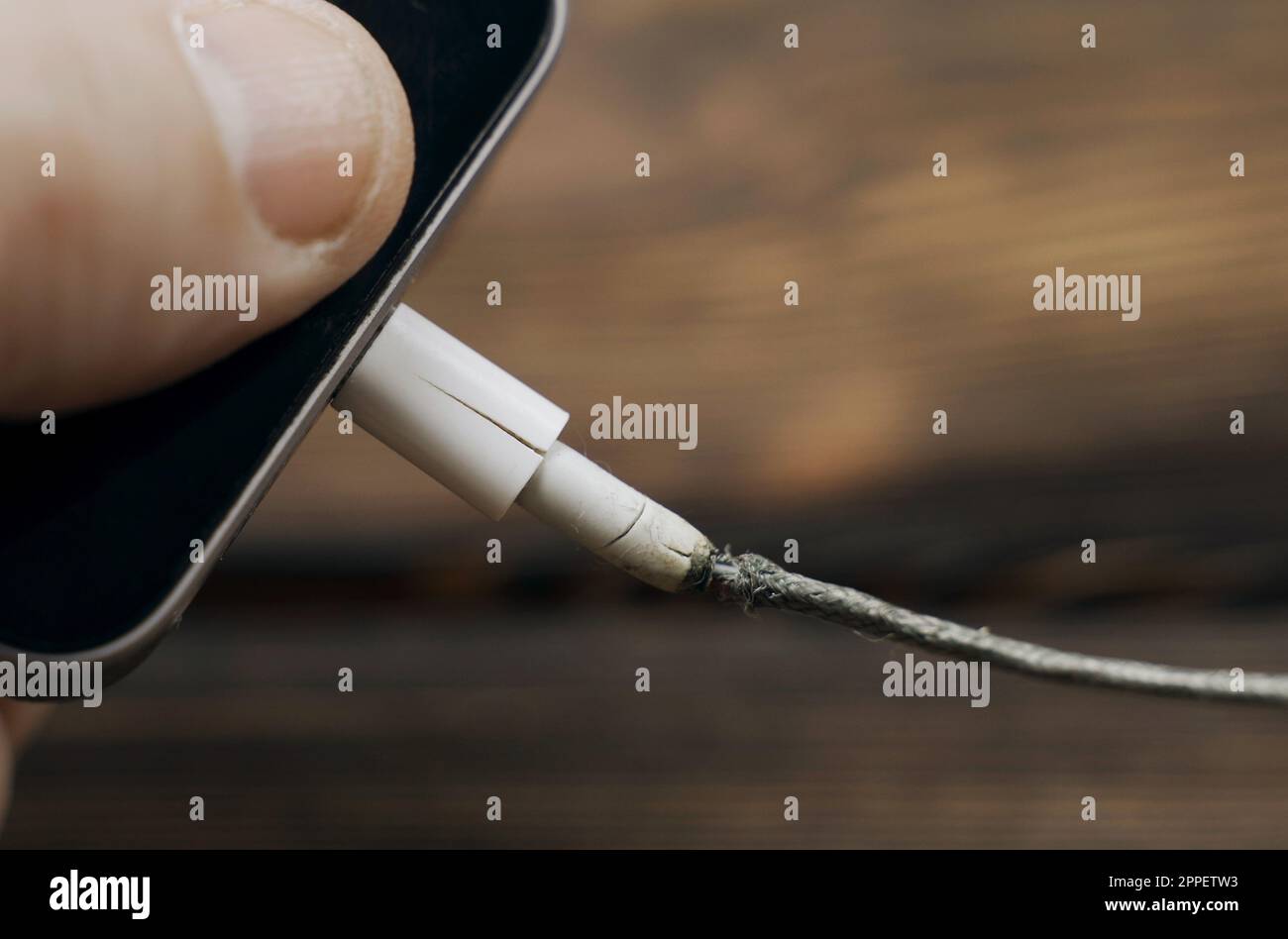Disconnecting the defective phone and connecting a new charger cable