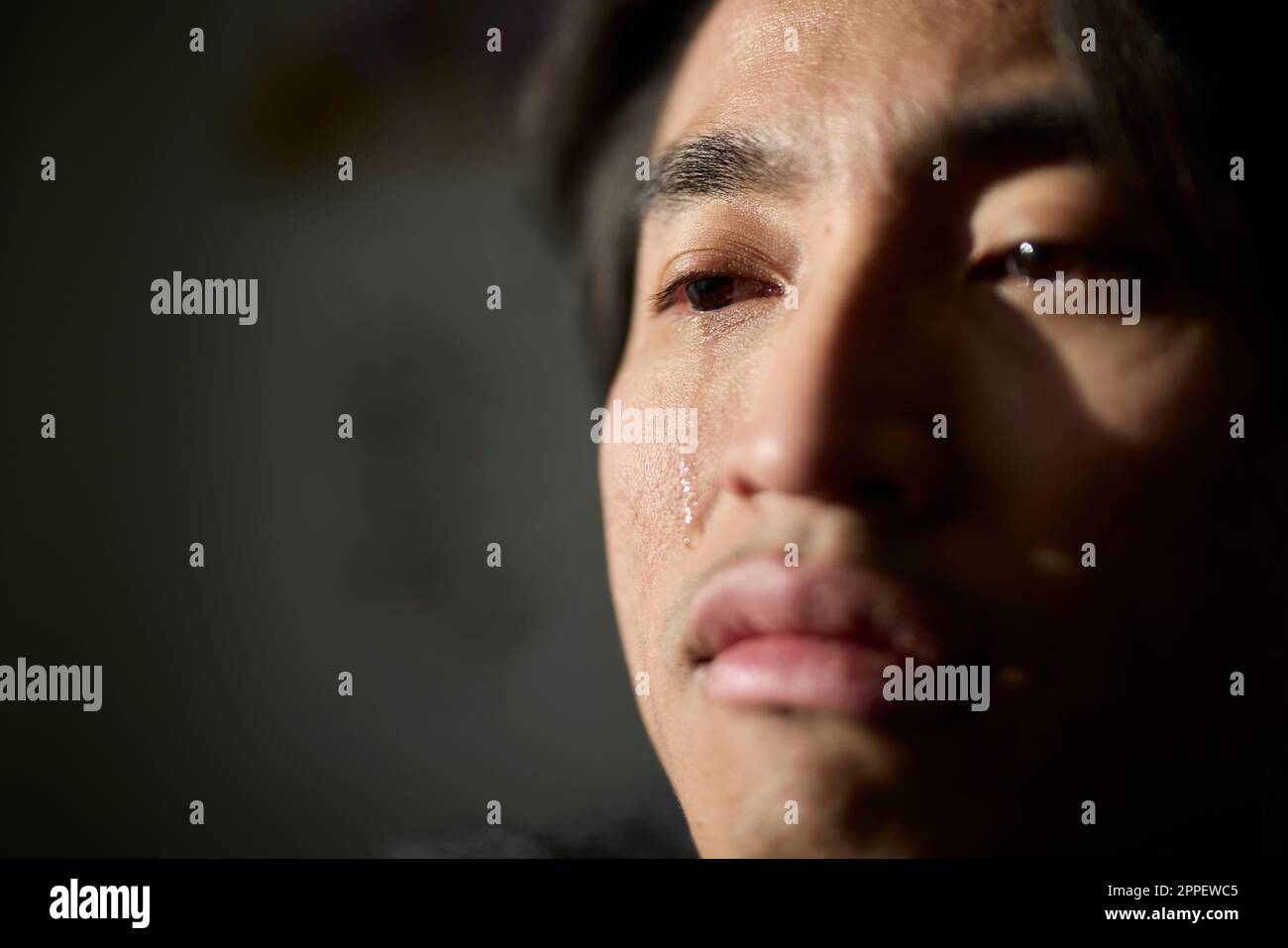 Portrait of crying man Stock Photo - Alamy