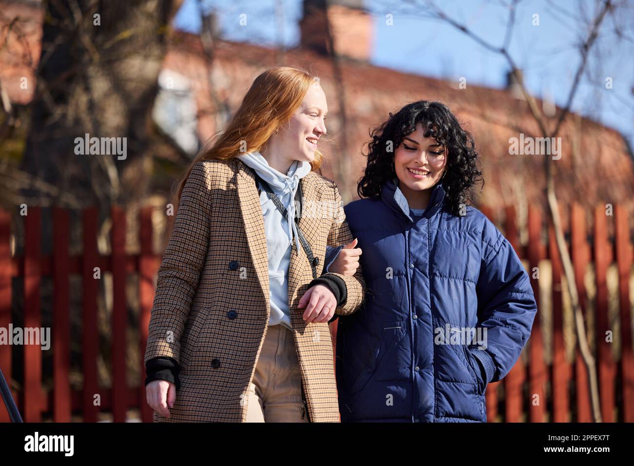 Mature women friends walking winter hi-res stock photography and images ...