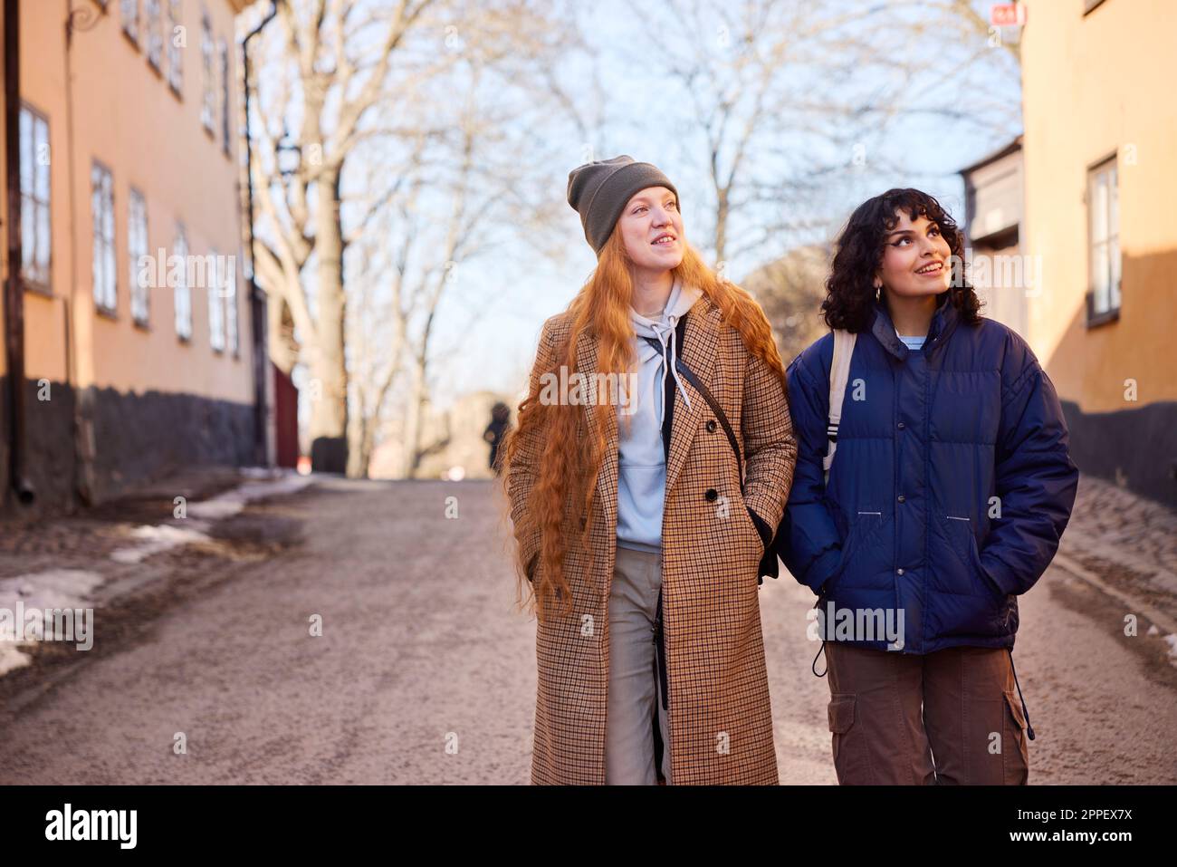 Mature women friends walking winter hi-res stock photography and images ...