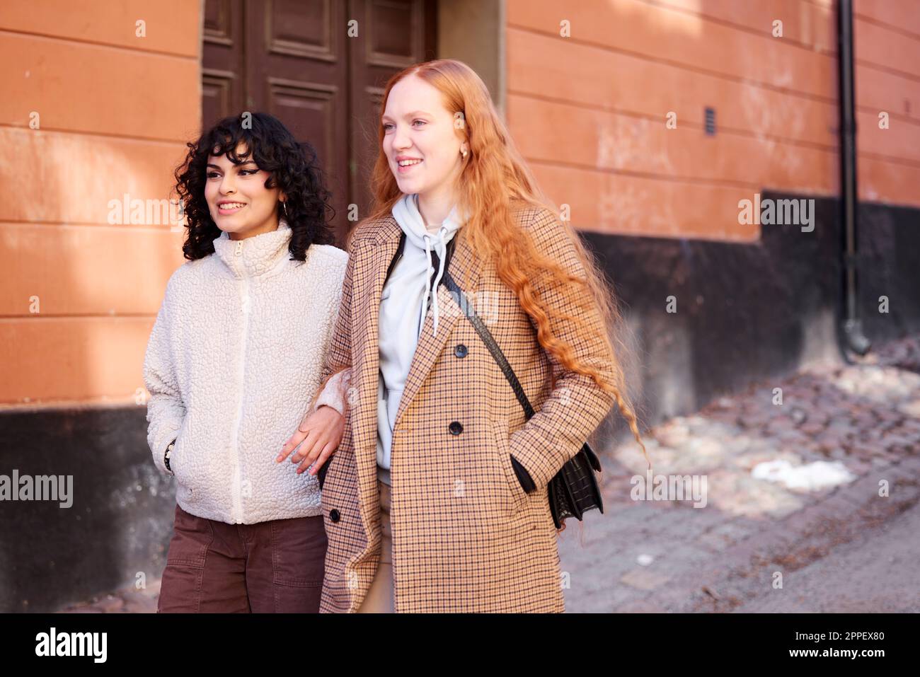Mature women friends walking winter hi-res stock photography and images ...