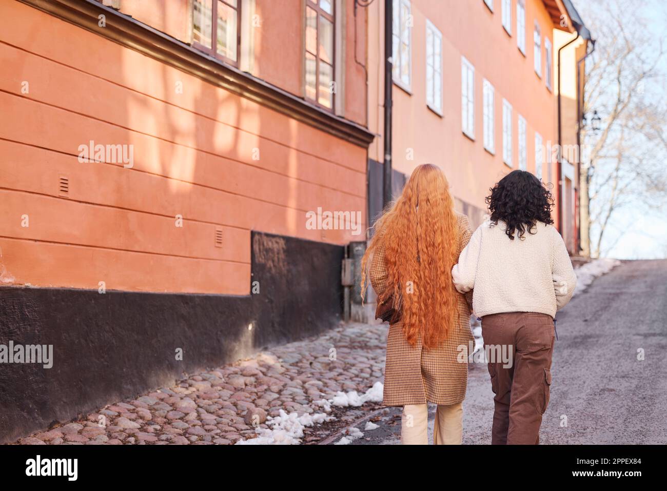 Mature women friends walking winter hi-res stock photography and images ...