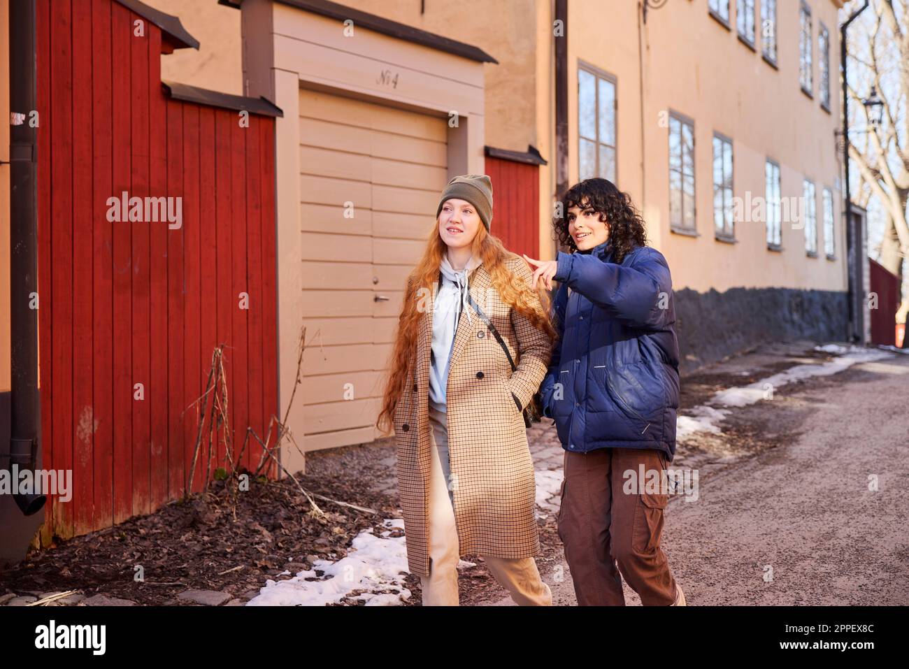Mature women friends walking winter hi-res stock photography and images ...