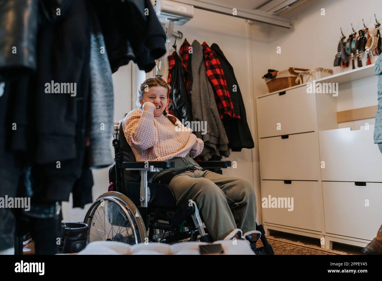 Smiling girl on wheelchair Stock Photo - Alamy