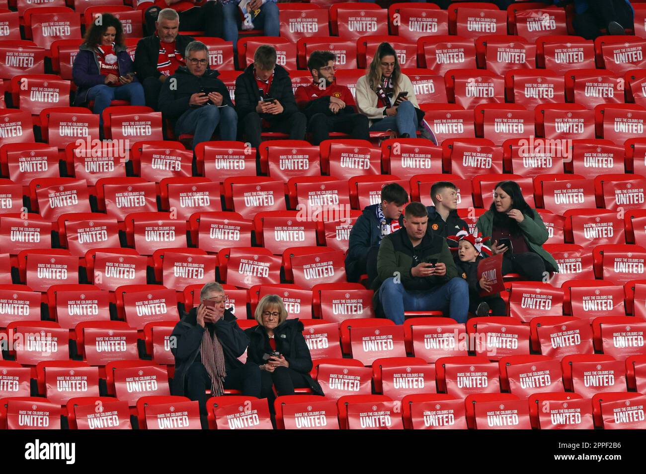 London, UK. 23rd Apr, 2023. People check their phones as the emergency