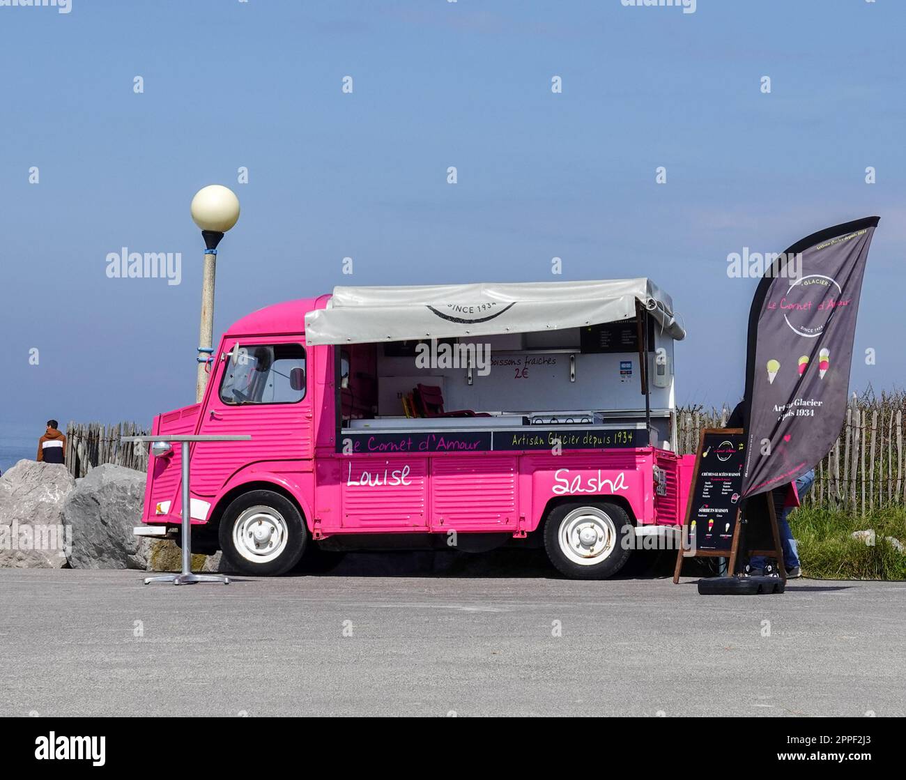 Artisan ice cream, served out of a cute pink truck, beach at Berck-sur-Mer, France. Stock Photo