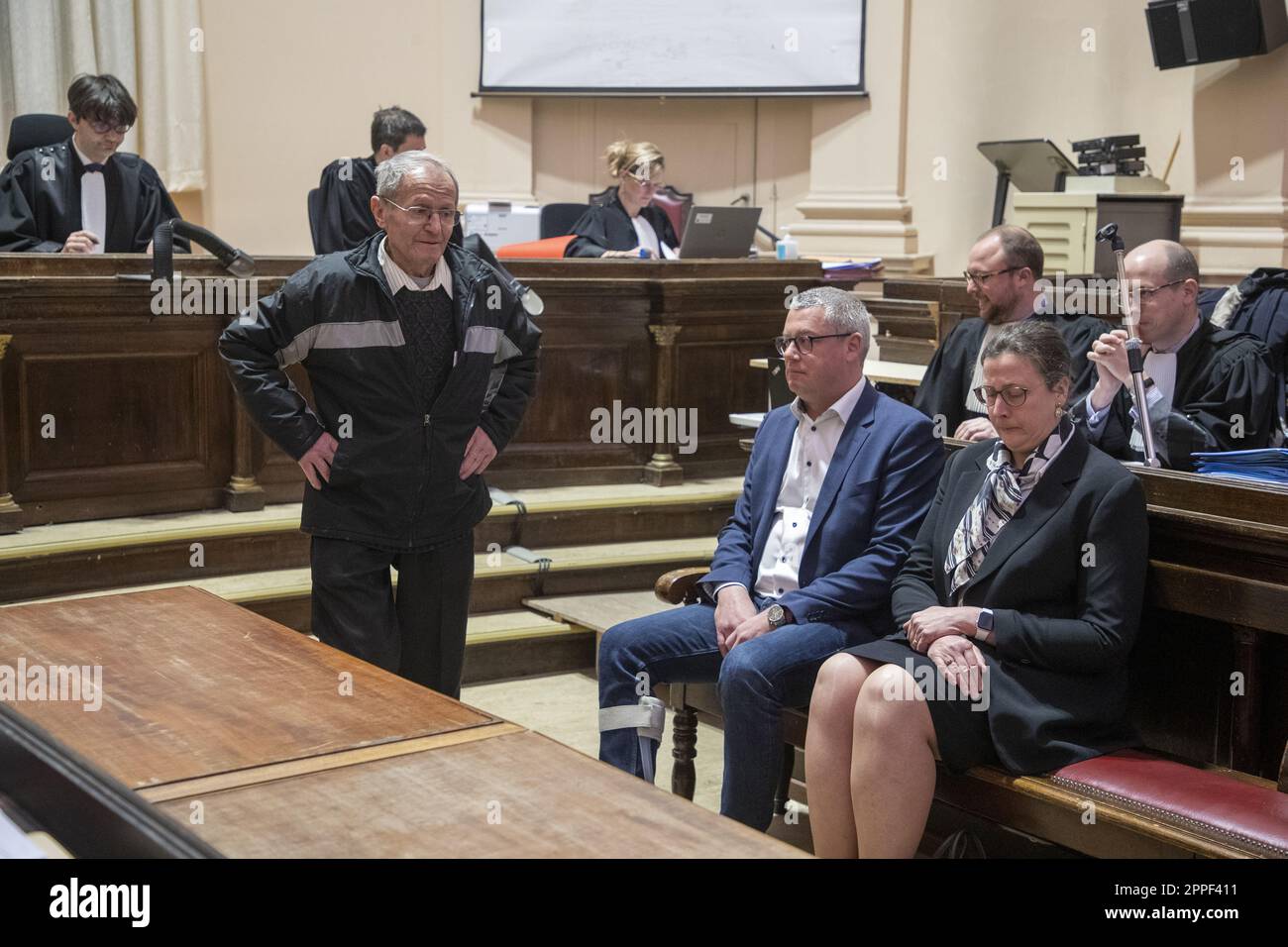 Former Neufchateau Mayor Dimitri Fourny (C) and other accused pictured during a session of the correction court, with the examination on the merits of the case of the false proxies which disrupted the 2018 Neufchateau local election, before the correctional court in Mons, Monday 24 April 2023. Twenty-two people, including the former parliament member and former mayor Fourny and some of his relatives, are warned in this case. They are charged with forgery in writing, use of forgery and breach of trust within the framework of a criminal association. About sixty people have joined as civil partie Stock Photo