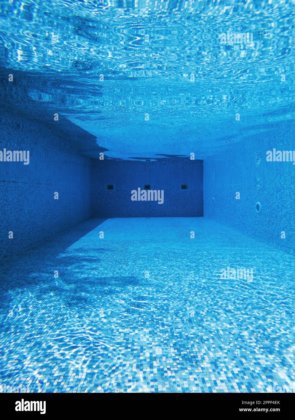 Outdoor swimming pool, underwater view as abstract background for