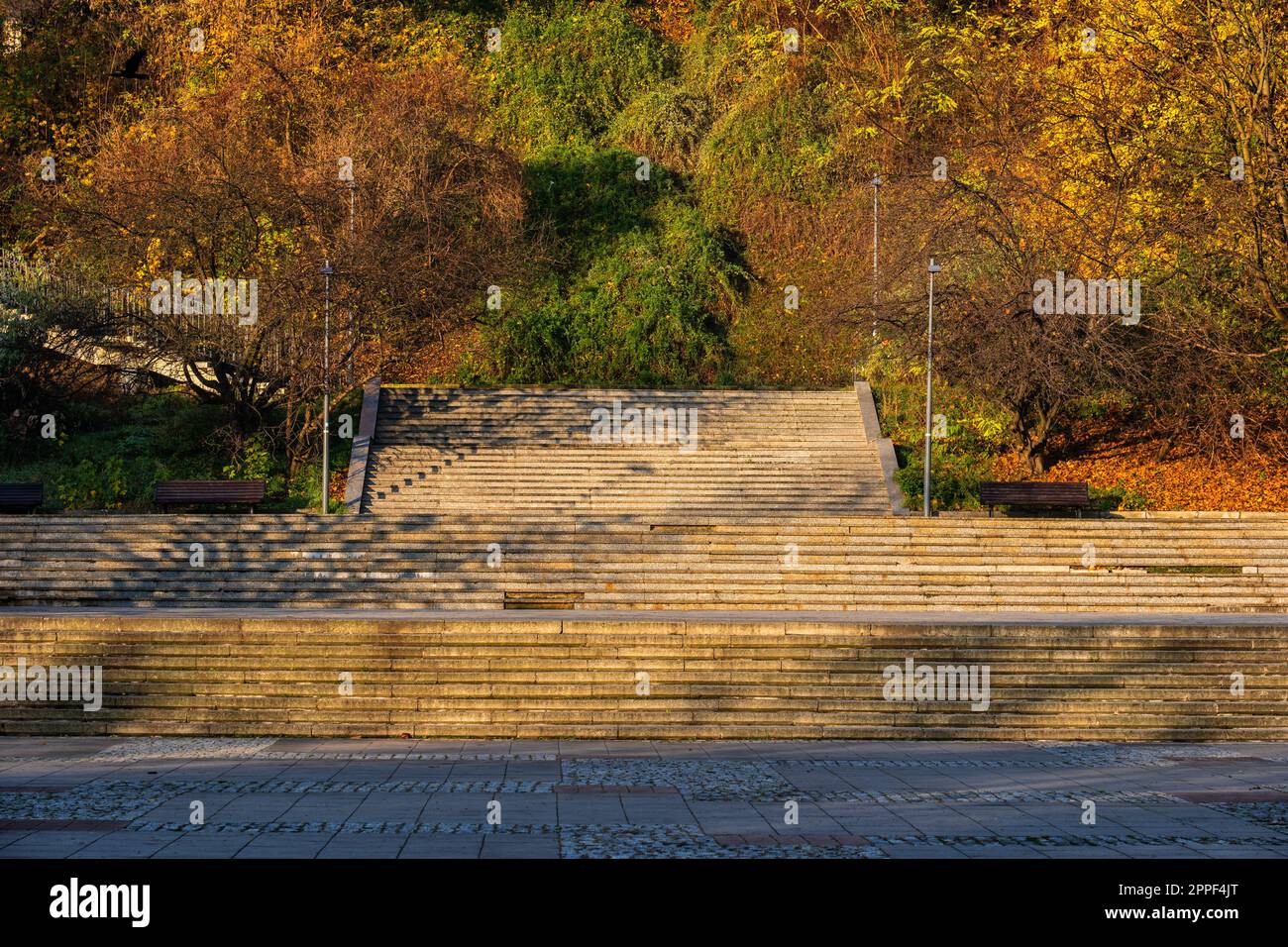 Monumental stairs on a hillside in autumn park in the morning. Stock Photo