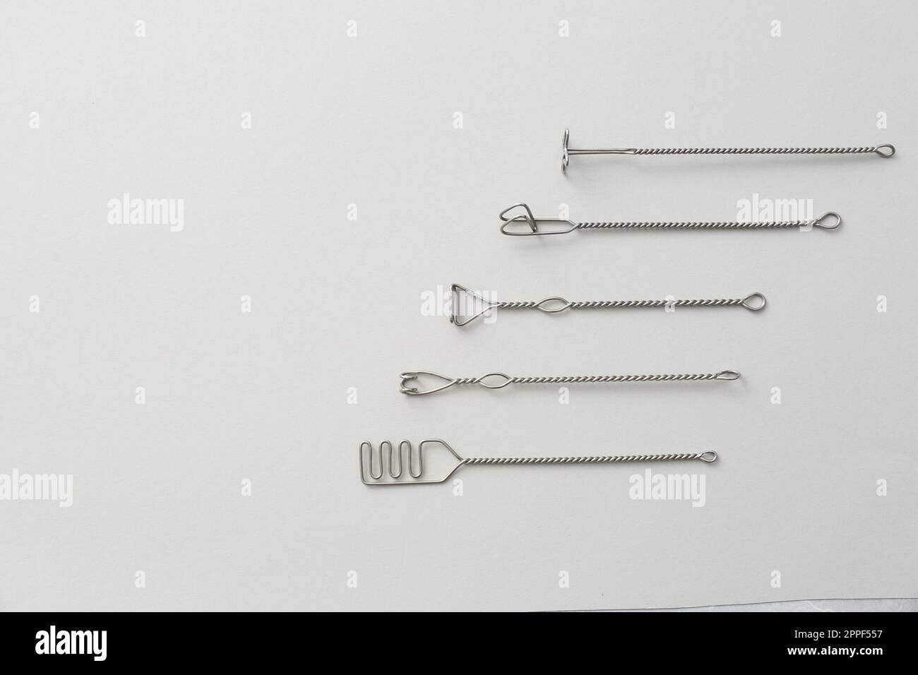 Text Probe Set of logopedic probes for speech therapy on light grey background ...