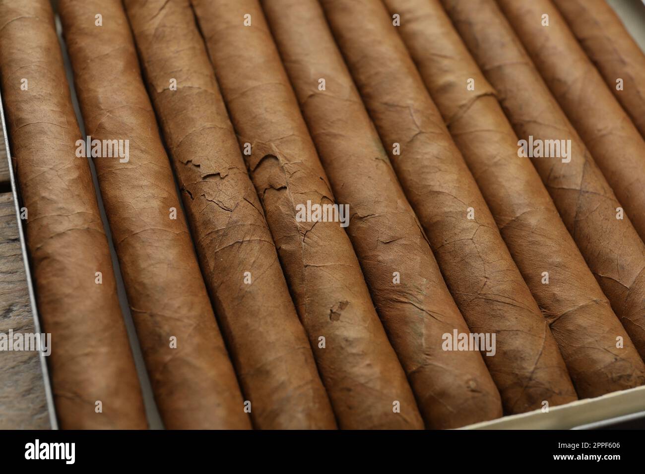 Many expensive cigars in box on table, closeup Stock Photo Alamy