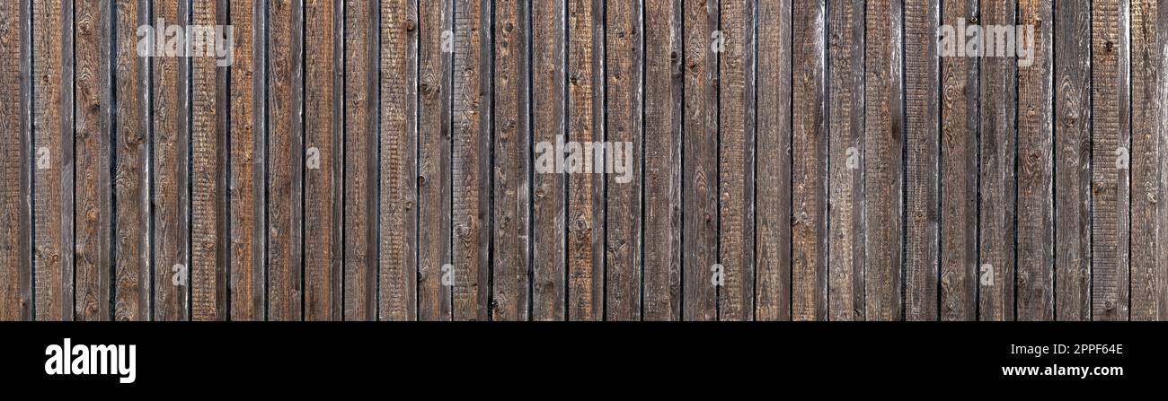 Rustic old brown wooden wall with weathered texture Stock Photo