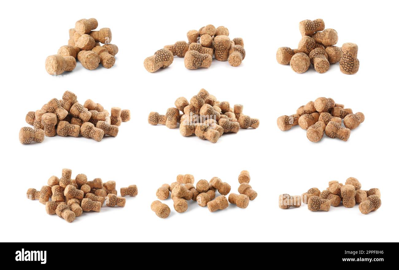 Set with corks of sparkling wine bottles on white background Stock Photo