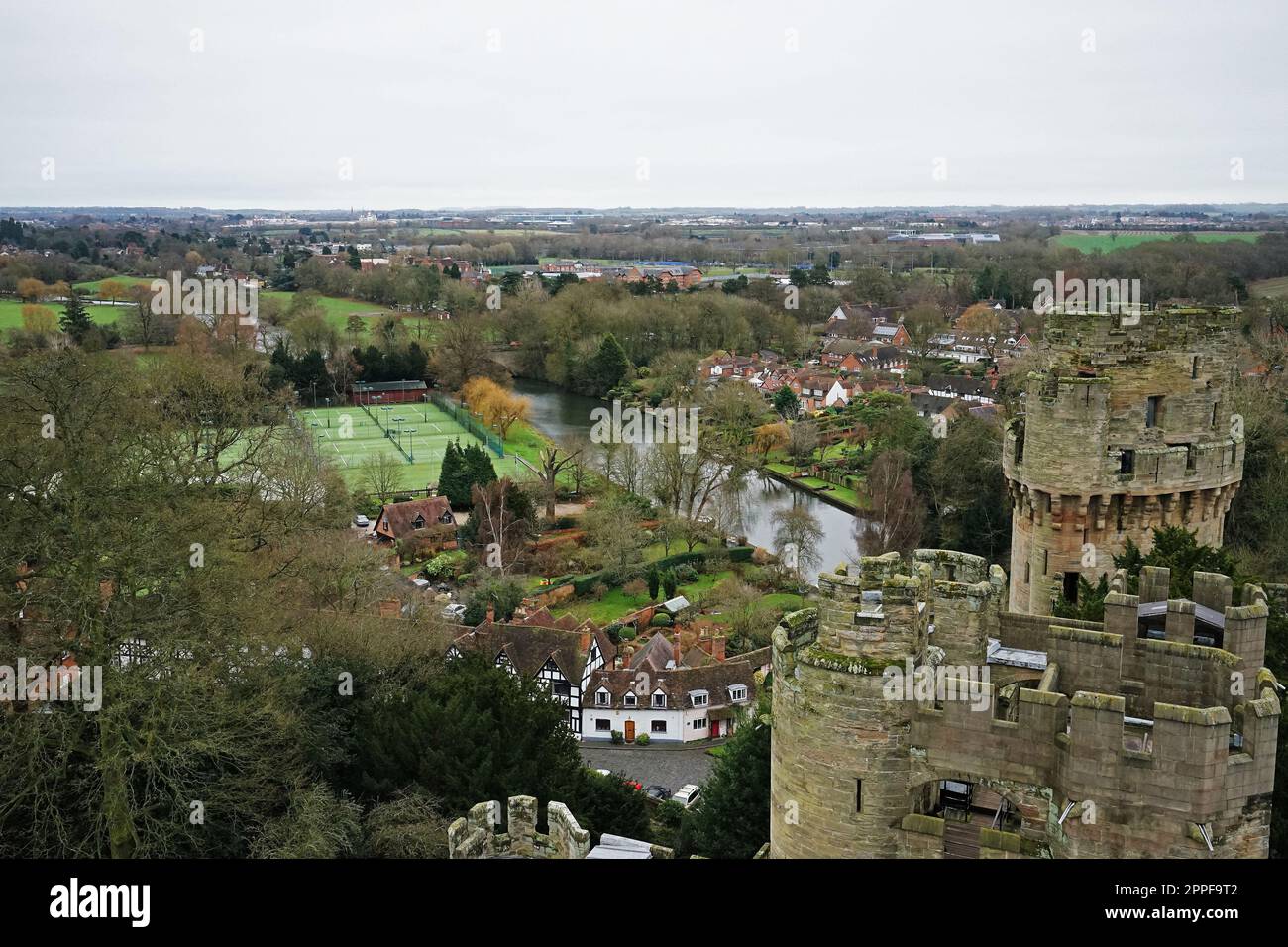 Exterior architecture and building design at Warwick castle, Medieval Fortress on the banks of the river Avon developed from a wooden fort- UK Stock Photo