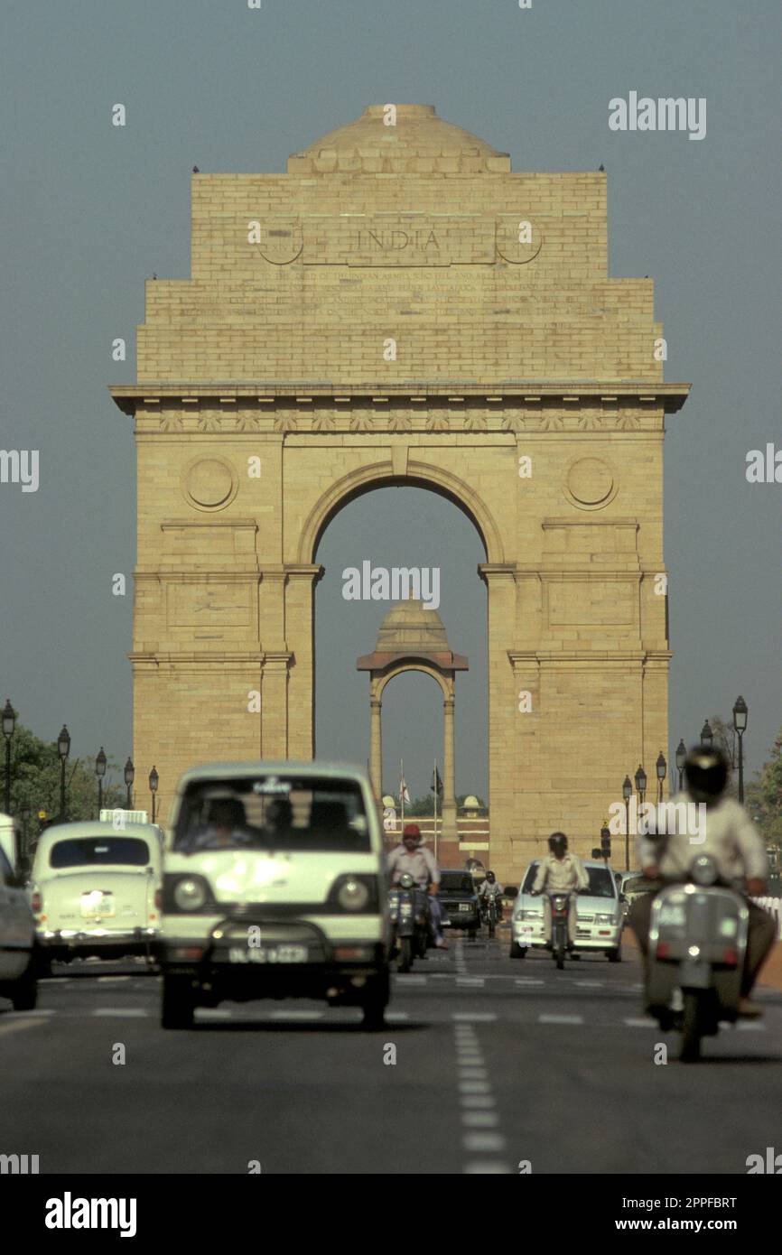 cars and traffic in front of the Delhi Gate in the city of New Delhi in