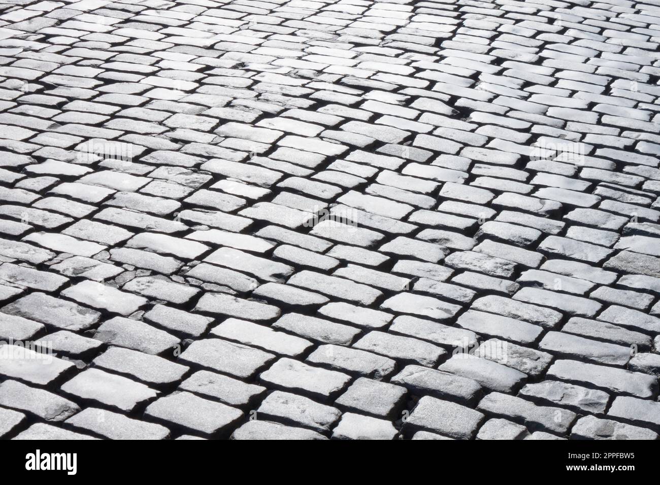 black and white photo of old cobblestone road Stock Photo - Alamy
