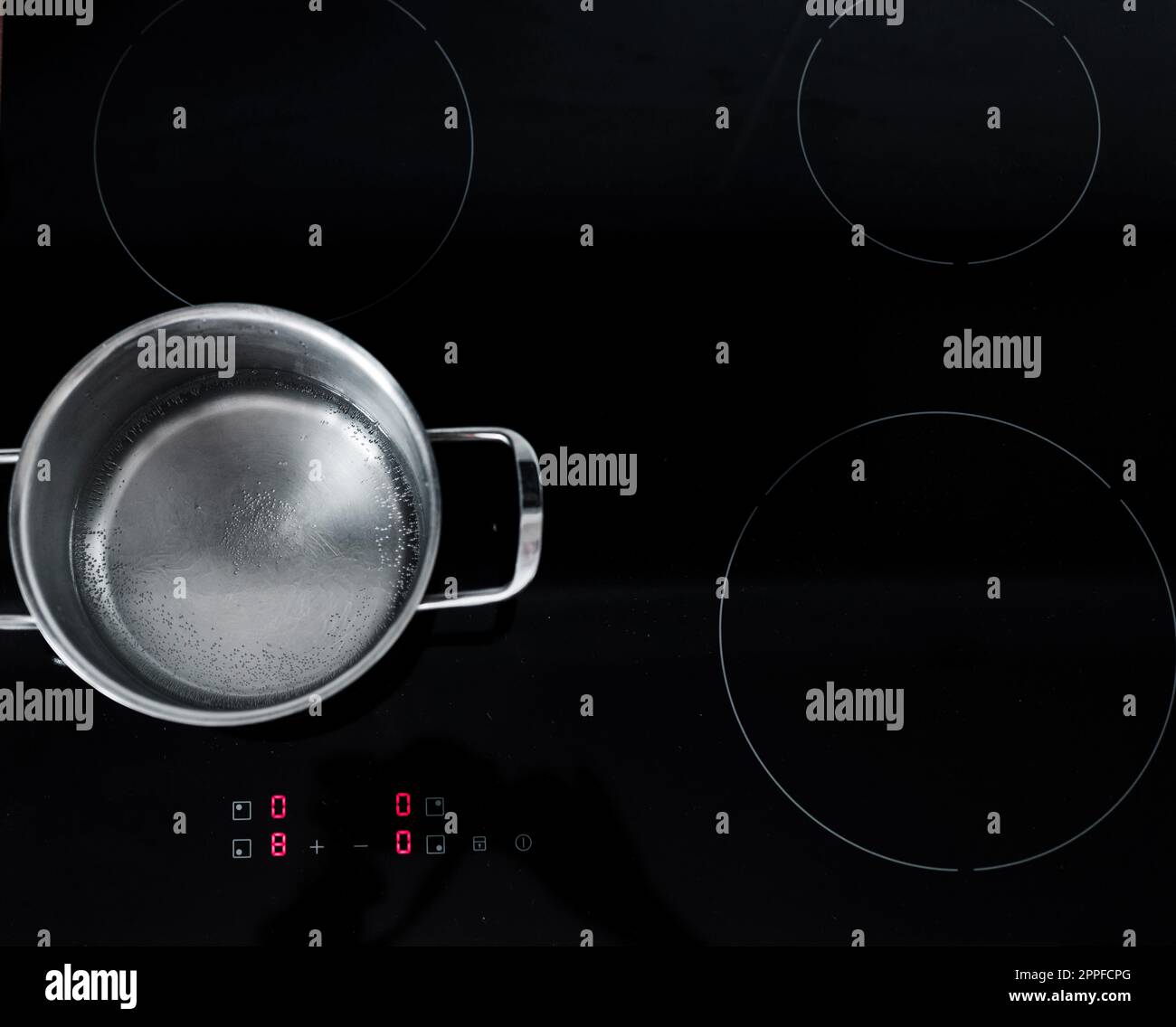 top view of a boiling pot. rapid boiling of water on an induction