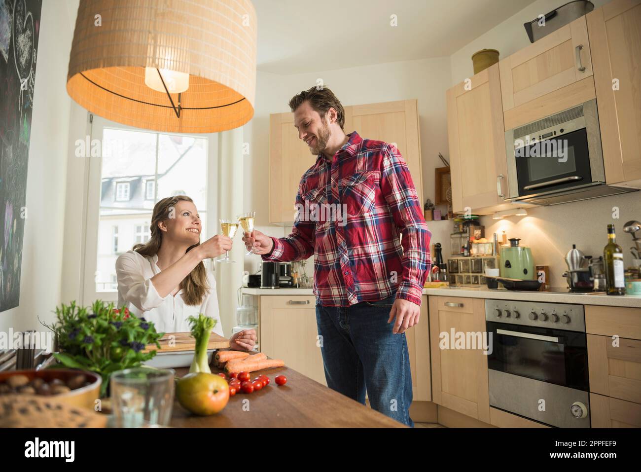 Young german couple in kitchen hi-res stock photography and images - Alamy