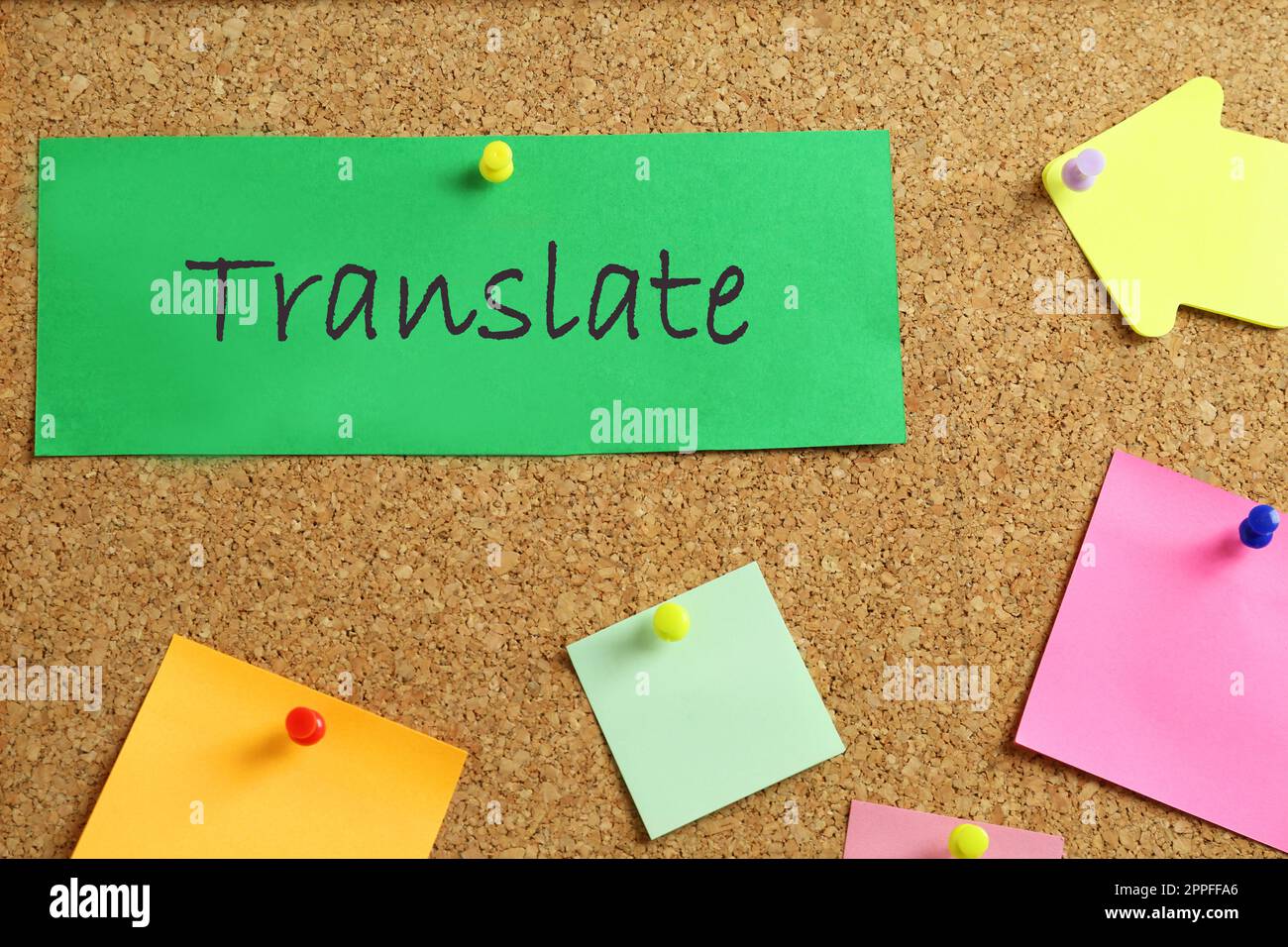 Note with word Translate pinned to cork board Stock Photo Alamy
