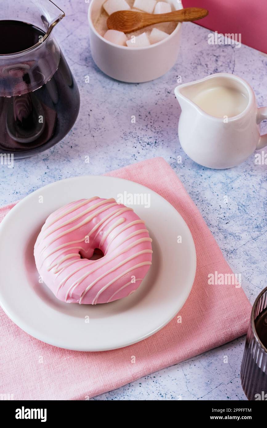 homemade donuts with pink berry glaze Stock Photo - Alamy