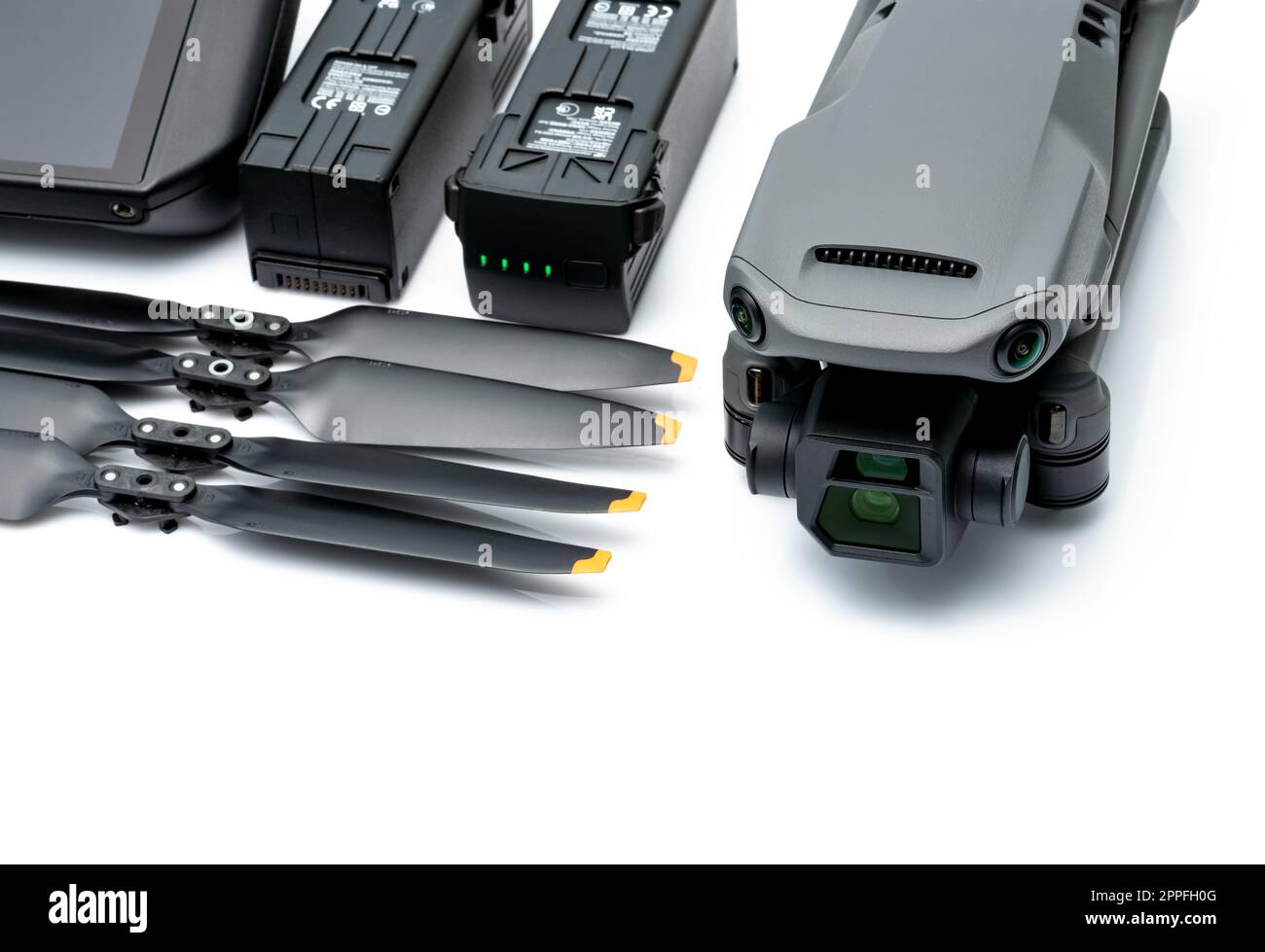 Drone and propeller blades on blur drone LiPo rechargeable battery. UAV or unmanned aerial