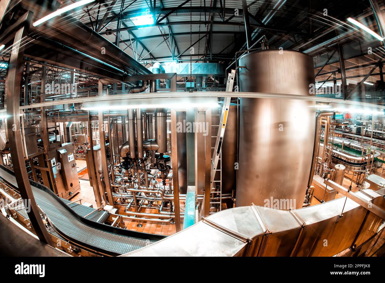 The interior of the brewery. Conveyor Stock Photo