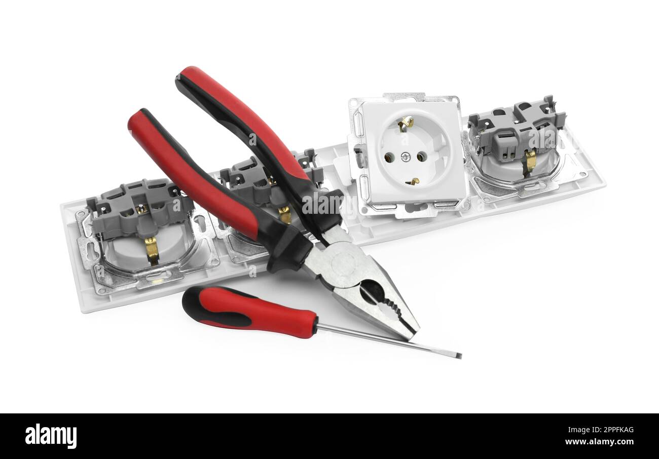 Set of sockets and electrician's tools isolated on white Stock Photo