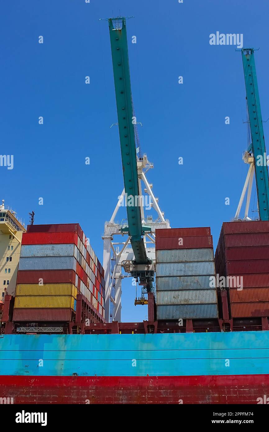 Container ship at Port Miami, one of the largest cargo ports in the US. Stock Photo