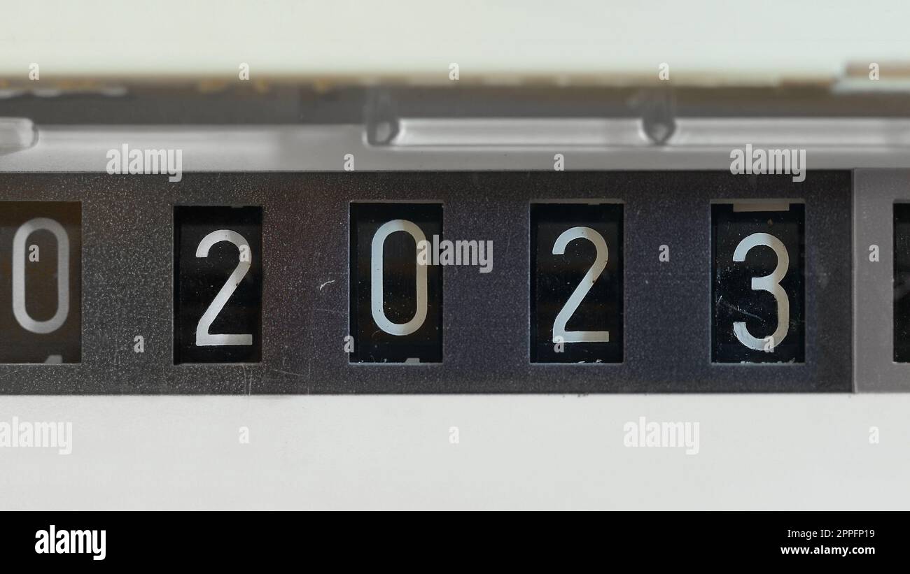 New year 2023 on a mechanical counter of gas meter Stock Photo