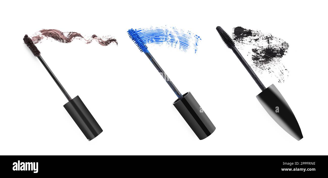 Set with different brushes and mascara strokes on white background, top view. Banner design Stock Photo