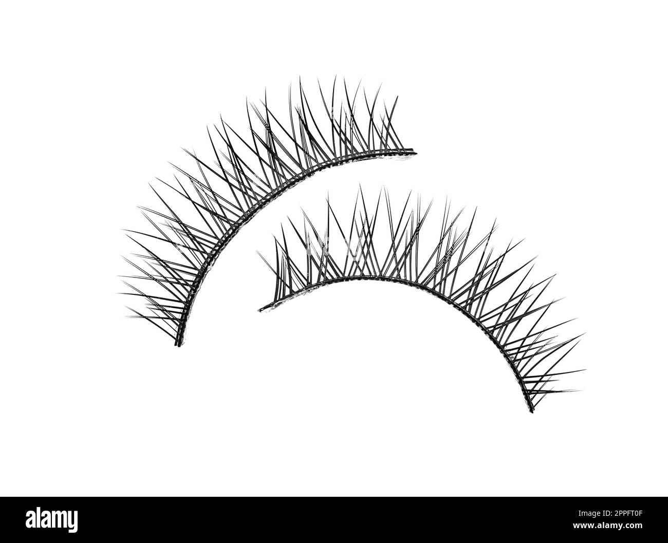 Fake eyelashes on white background, top view. Makeup product Stock