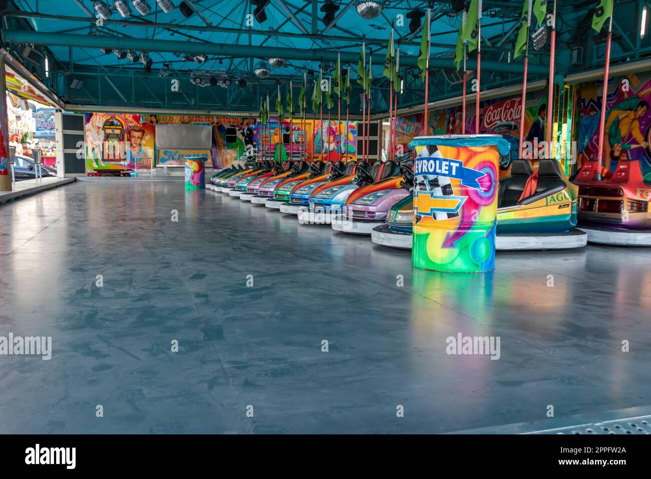 DÃ¼sseldorf, NRW, Germany - 07 14 2022: bumper cars and dodgem cars waiting for drivers on the Dusseldorfer Rheinkirmes amusement park as big parish fair and kermis in Germany for fun and action cars Stock Photo