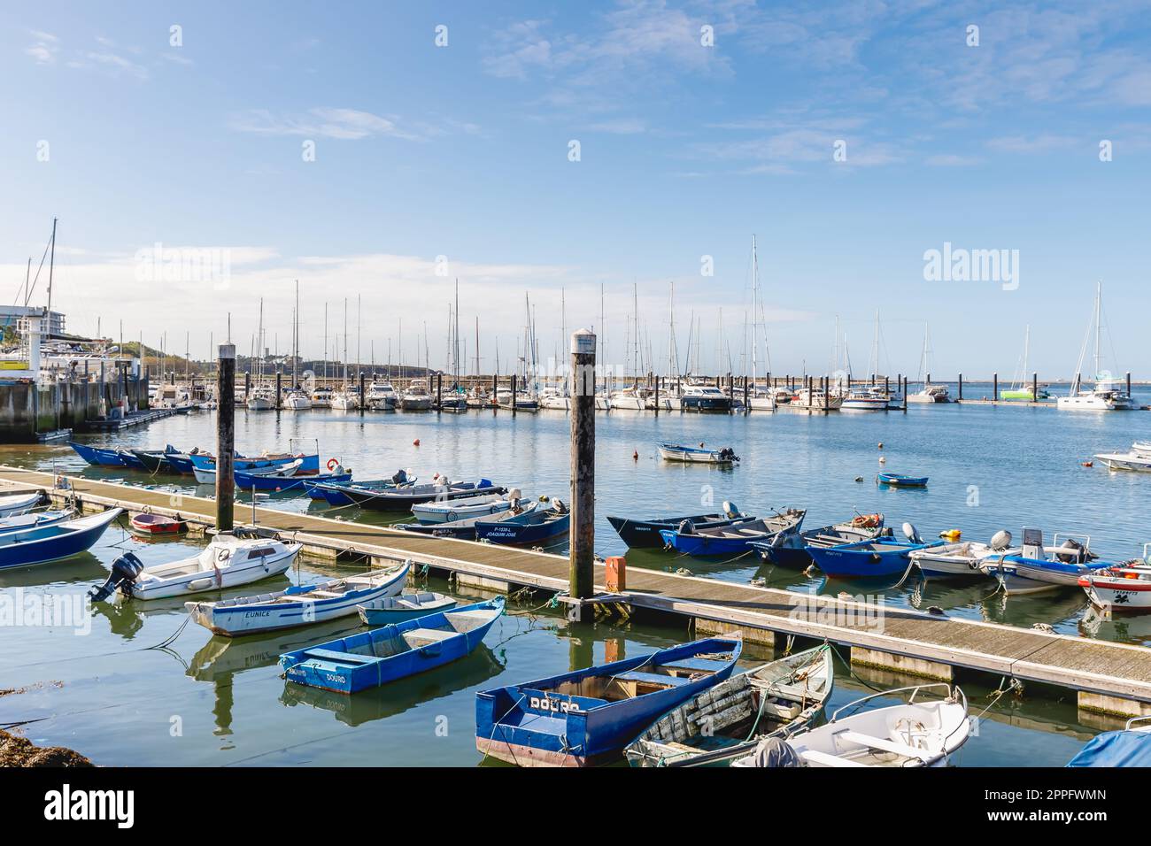 Small fishing boats in the fishing port of Afurada Porto, Portugal Stock Photo
